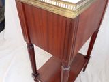 a wooden table with a marble top on a white background