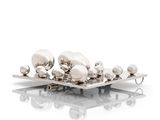 a tray with a bunch of silver objects on top of it