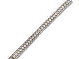 un bracelet en diamants, signé Cartier