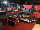an image of a large room with a lot of chairs and tables