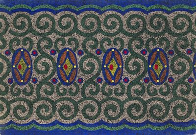 un gros plan sur un tapis orné d'un motif