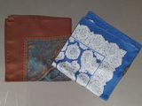 two different types of purses on the table