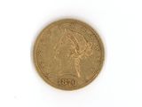 l'image d'une pièce d'or sur laquelle figure une tête de femme