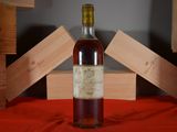a bottle of wine that is sitting on a table