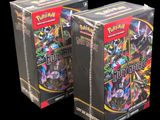 two boxes of pokemon trading cards are shown on a black background