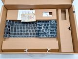 a box with a keyboard inside of it on a table