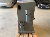 an image of a machine that is on a pallet in a garage