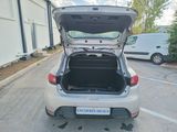 a car with its trunk open in a parking lot