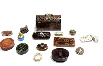 many different types of jewelry sitting on a white surface