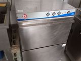 a stainless steel dishwasher sitting in the middle of a kitchen