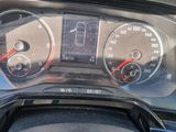 a close up of a car dashboard with a speedometer and gauges