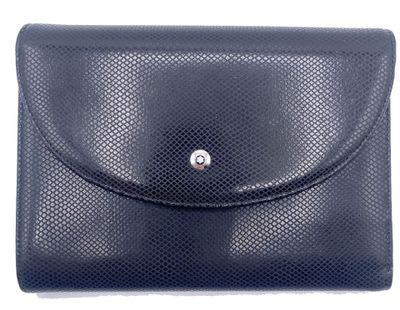 a black leather wallet with a metal button on the front