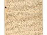 une lettre écrite en cursive sur une feuille de papier