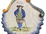 a picture of a decorative plate with a man on it