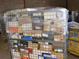 a large cart with many boxes on it in a warehouse