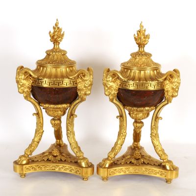 pair of antique gold and red marble urns on pedestals