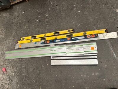 several different types of tools are laid out on the ground