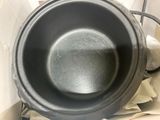 a pot that is sitting on top of a stove