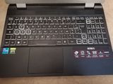 a black laptop with a keyboard on a table