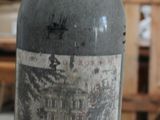 a bottle of wine that is sitting on a table