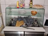 a small kitchen with a stove and a counter top