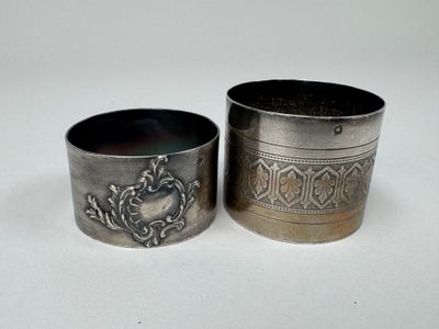 pair of antique silverplated napkin holders with floral designs