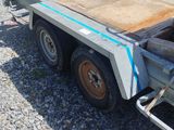 an image of a flatbed trailer with a flat bed
