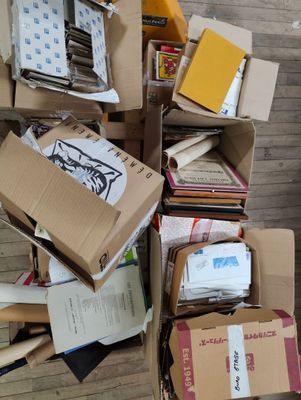 a pile of boxes that are sitting on the floor