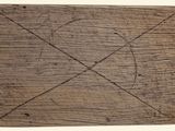 a piece of wood that has been cut in half