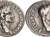 a silver coin with an image of a woman on it