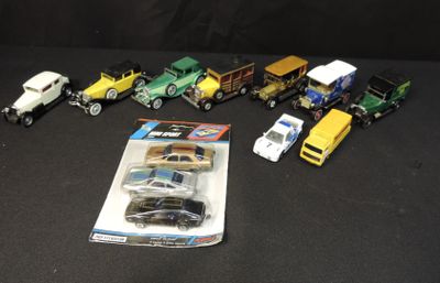 a lot of toy cars and trucks on the table