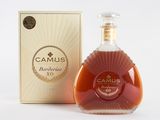 an image of a bottle of camus brandy next to a box