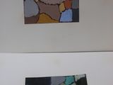 two paintings of different colors on a white surface