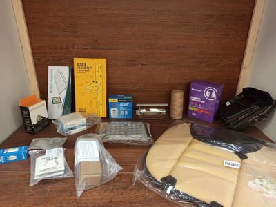 many items that are sitting on a wooden table