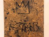 an image of a piece of brown paper with writing on it