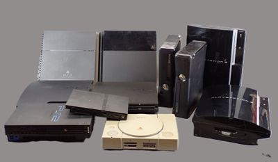 a lot of electronic devices that are sitting on top of each other