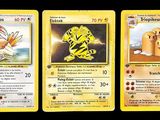 trois cartes Pokémon présentant des motifs différents sur un fond noir