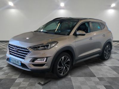 the silver suv is parked on a checkered tile floor