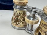 a close up of a pair of binoculars on a table