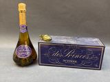 a bottle of wine next to a box of wine
