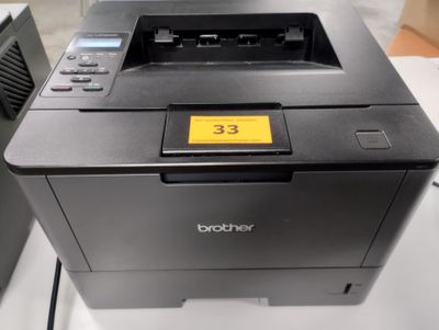 a printer that is sitting on a table in a room