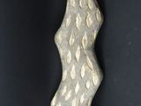 an image of a decorative object hanging on a wall