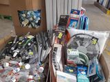 many items in the boxes on the floor in the store