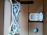 a box with a bunch of wires and a remote in it