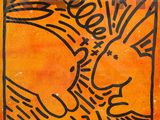 painting of a bird on a orange background with a black outline