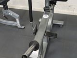 a machine that is sitting on the floor in the gym