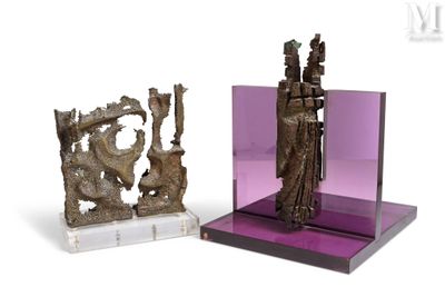 a statue of a man and a woman on a table