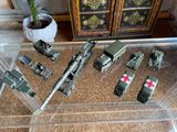 a lot of military vehicles that are on the table