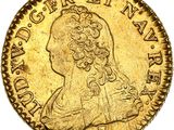 l'image d'une pièce d'or sur laquelle figure une tête de femme