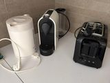 three different types of appliances sitting on a counter